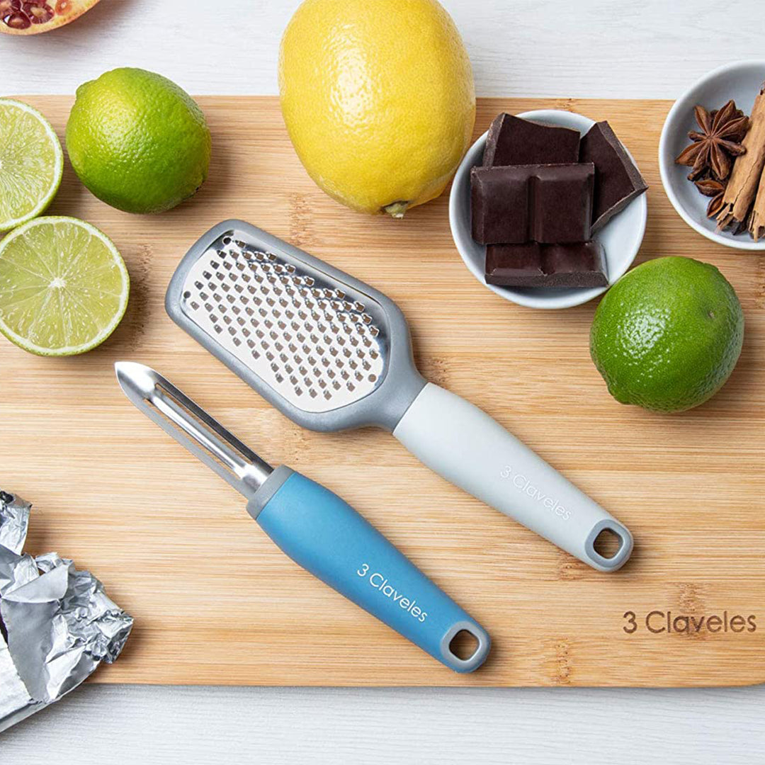 3 Claveles - Vaciador Oval Profesional de 15.5 cm en Acero Inoxidable